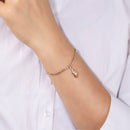 Rose Gold Bracelet With A Shell Pendant