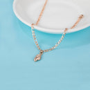 Rose Gold Bracelet With A Shell Pendant